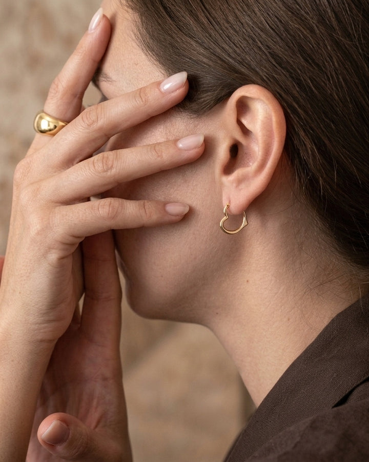 Sideways Heart Hoop Earrings model