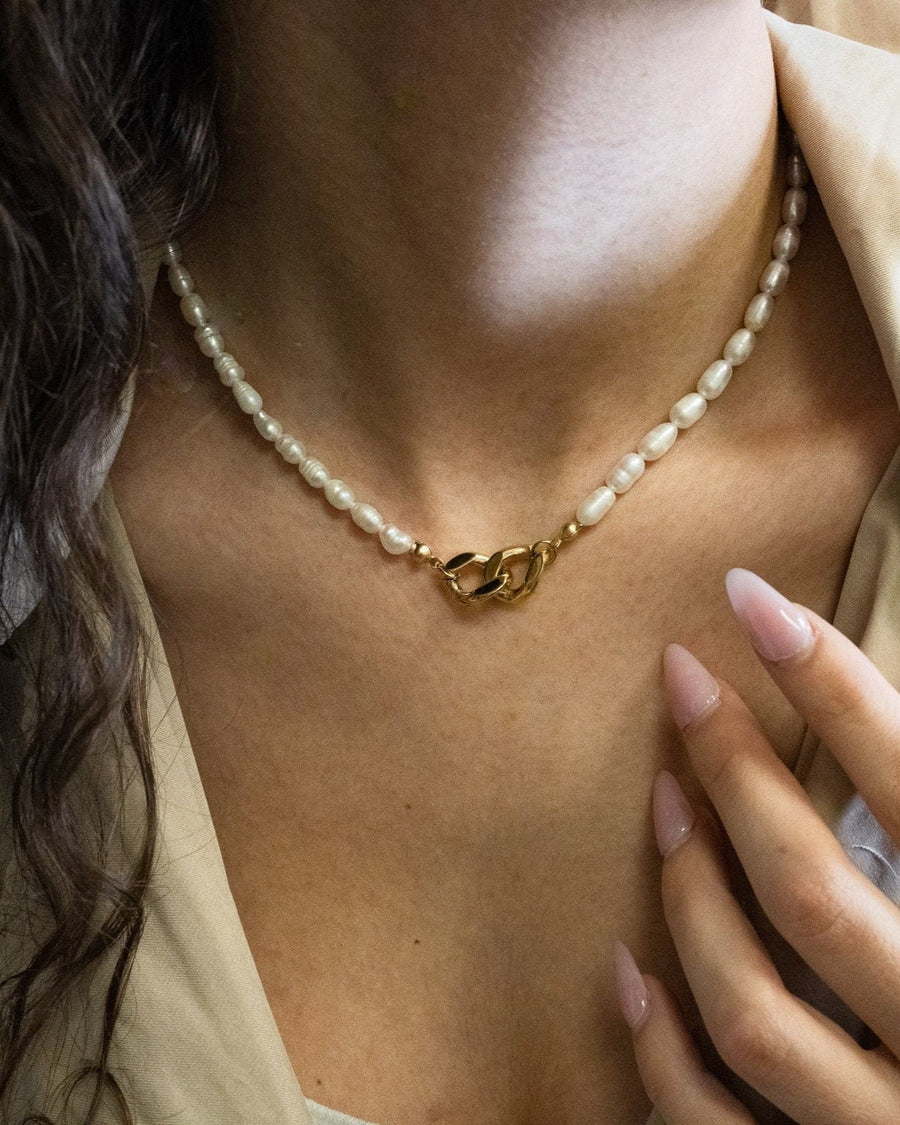 Model Image - Eternal Bond Necklace with pearl accents and gold-plated center detail worn on model