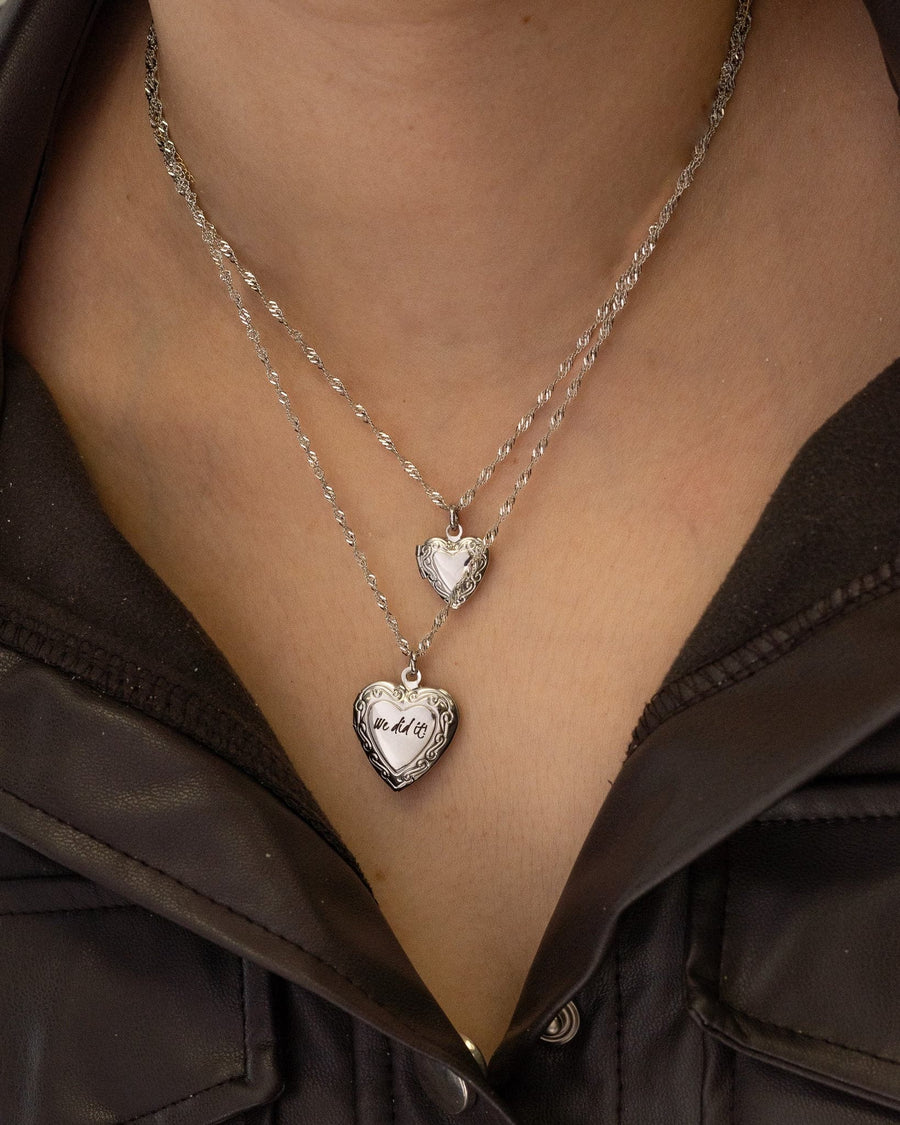 Model Image - layered heart locket necklaces with engraved pendants on the neckline worn on model