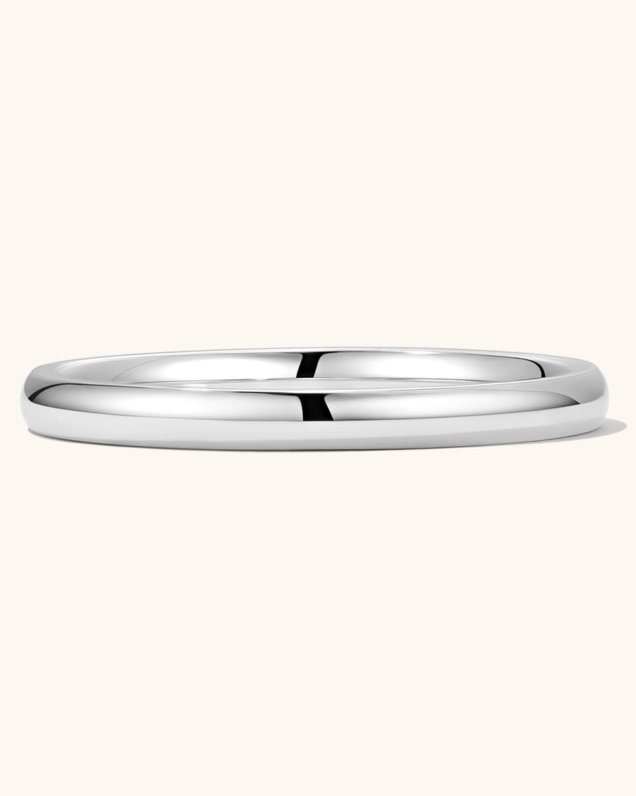Detail Image - 2mm silver band ring in a low side view, showing the slim rounded profile
