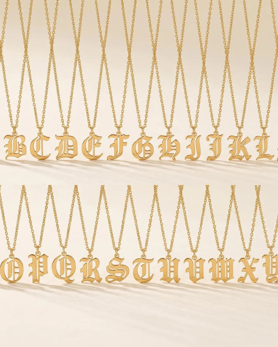Detail Image - 18k Gold Old English initial necklaces showing multiple letter pendant options on delicate chains